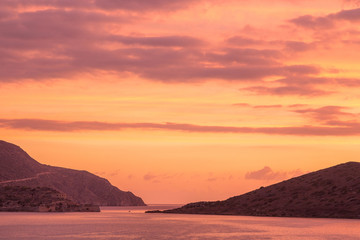 Naklejka na ściany i meble A magnificent dawn over Mirabello Bay. Also seen is the island of Spinalonga. Crete. Greece