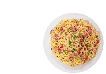 capellini pasta and sauce with bacon. top view. isolated on white