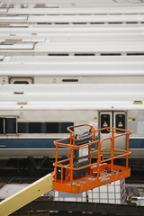 Lifting platform in train station. Aerial platform. Hydraulic lift.