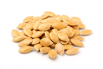 Heap of pumpkin seeds isolated .