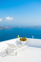 Fototapeta na wymiar Chaise lounge on the terrace with sea view.