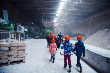 children on the tour at the factory