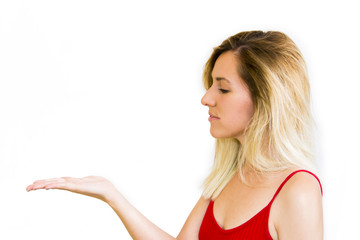 Fototapeta premium Portrait of a beautiful blond woman with her open hand