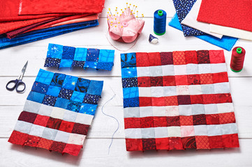 Fototapeta na wymiar Square pieces of fabrics selected and stitched like a flag of USA