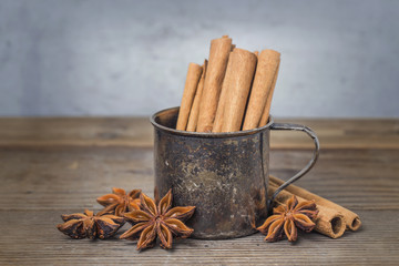 Coffee, coffee beans, coffee powder, aniseed, cinnamon, cup, bowl