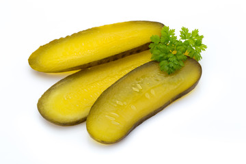 Marinated pickled cucumbers isolated on the white.