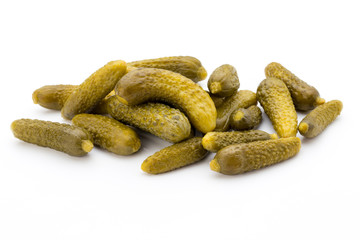 Marinated pickled cucumbers isolated on the white.