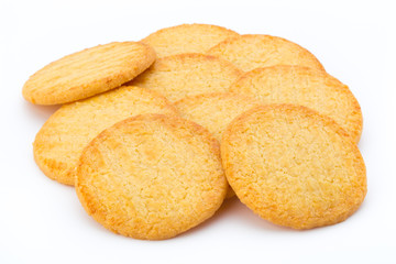 Stacked short pastry cookies isolated on white background.