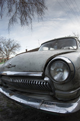 Fototapeta premium The old abandoned car close-up 2