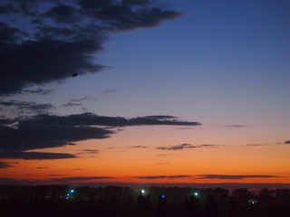 Festival, open air.  The evening sky.