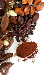 cocoa beans and assortment of chocolate candies