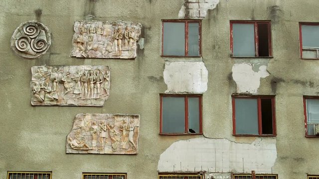 soviet building exterior with murals