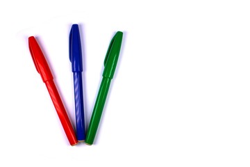 Red, blue and green pen isolated on white background