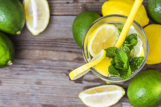 A wooden table drinks Lemon Mint