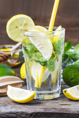 Fototapeta premium A wooden table drinks Lemon Mint