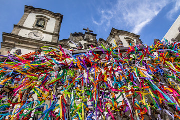 Colorful ribbons of Lord of Bonfim in front of Nosso Senhor do Bonfim Church - Salvador, Bahia, Brazil