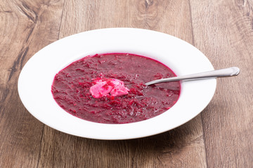 Vegetable soup on a wooden table