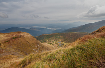 Autumn mountain landscape with a dramatic sky. Carpathian