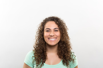 Studio portrait of an excited young woman 