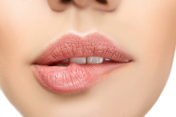 Fototapeta premium Lips of beautiful young woman, closeup