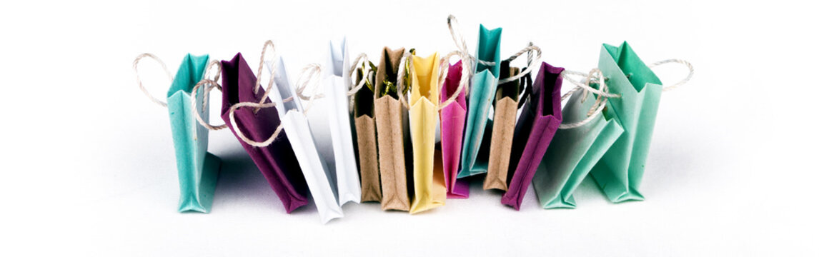 E-commerce online shopping concept. Miniature of reusable grocery bags.