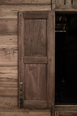 Fototapeta na wymiar Old grunge wood simple window and wooden wall