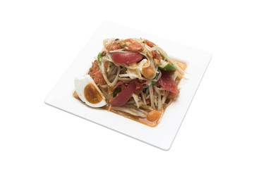 Thai style papaya salad with salt egg isolated on background