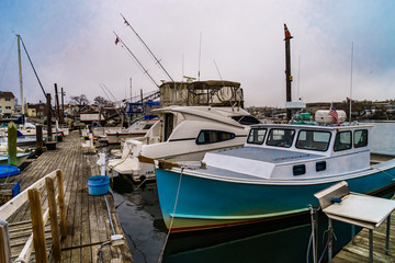 Fototapeta premium Fishing boats on pier of Jamaica Bay, Brooklyn
