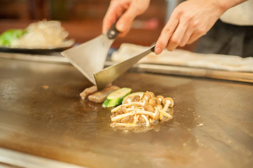 saute veggies,Grilling beef steak (japan kobe matsusaka),japanese style lobster, tepan yaki,selective focus ,vintage color