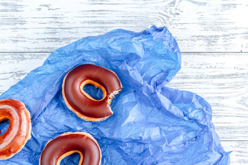 lunch with donuts on wooden table background top view mock up