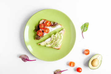 fitness breskfast with homemade sandwiches white table background top view