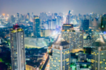Fototapeta premium City blurred lights background after sunset,Cityscape bokeh, Blur Photo, night landscape at twilight time,vintage color
