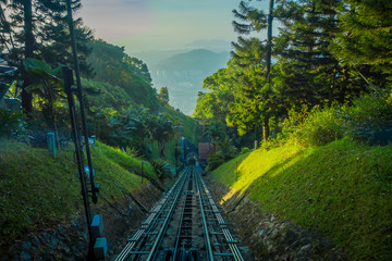 Fototapeta na wymiar Beautiful view from railroad going to Penang Hill, a hill resort comprising a group of peaks on Penang Island.