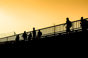 silhouette Myanmar workers crossing border to Thailand, Mae Sot, Tak, Thailand