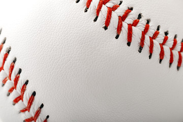 Macro image of a baseball with the closeup on the stitches with copy space - 146015904
