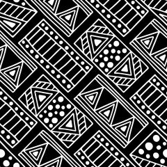 Seamless vector pattern. Black and white geometrical background with hand drawn decorative tribal elements. Print with ethnic, folk, traditional motifs. Graphic vector illustration.