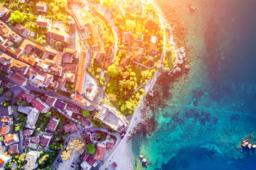 Top view of a beautiful city near the sea in the sunlight