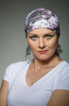 beautiful middle age woman cancer patient wearing headscarf