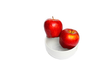 apple red  two in bowl and water drip on white background