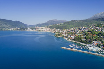 Fototapeta premium Top view of the beautiful city with a marina