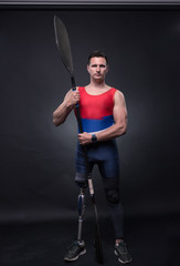 man canoe kayak paddle, athlete sportsman, prosthetic leg, disabled