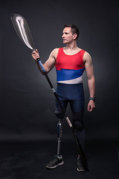 man canoe kayak paddle, athlete sportsman, prosthetic leg, disabled