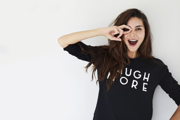 Joyful girl having fun in studio, portrait