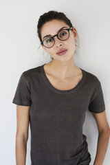 Confident girl in spectacles, portrait