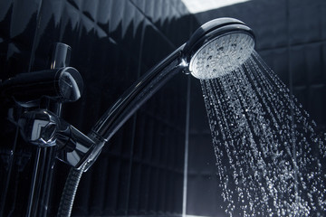 shower head with flowing water - obrazy, fototapety, plakaty