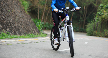 Fototapeta na wymiar cyclist cycling mountain bike on forest trail