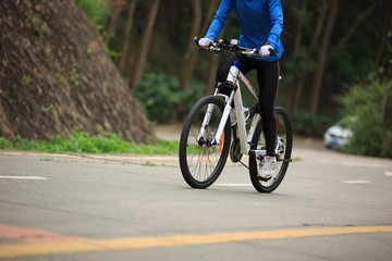 Fototapeta premium cyclist cycling mountain bike on forest trail