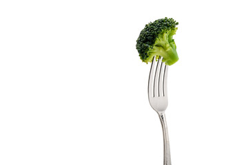 fresh broccoli on fork isolated on white. healthy lifestyle concept