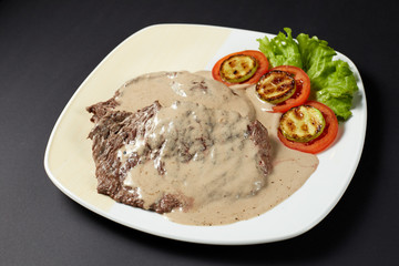 Beef in cognac sauce. Italian style. Italian food. Italian cuisine.