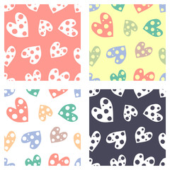 Set of seamless vector patterns with hearts. Background with hand drawn ornamental symbols. Template for wrapping, decor, surface, cards, backgrounds, textile, print. Decorative repeat ornament.